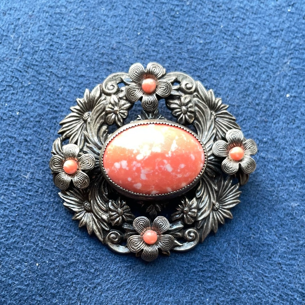 Sterling silver brooch with red garnet in the middle and around; vintage; Czech;